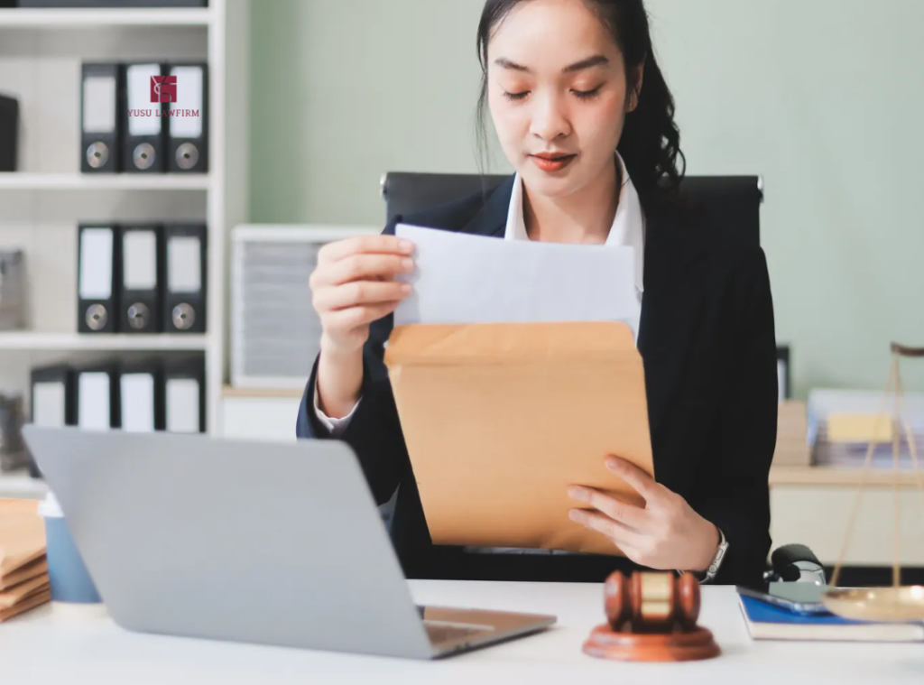 Already Paid a Fine — Now Being Investigated Again? How to Avoid Two Criminal Records in Korea Lawyer reviewing summary judgment documents for a Korean criminal case